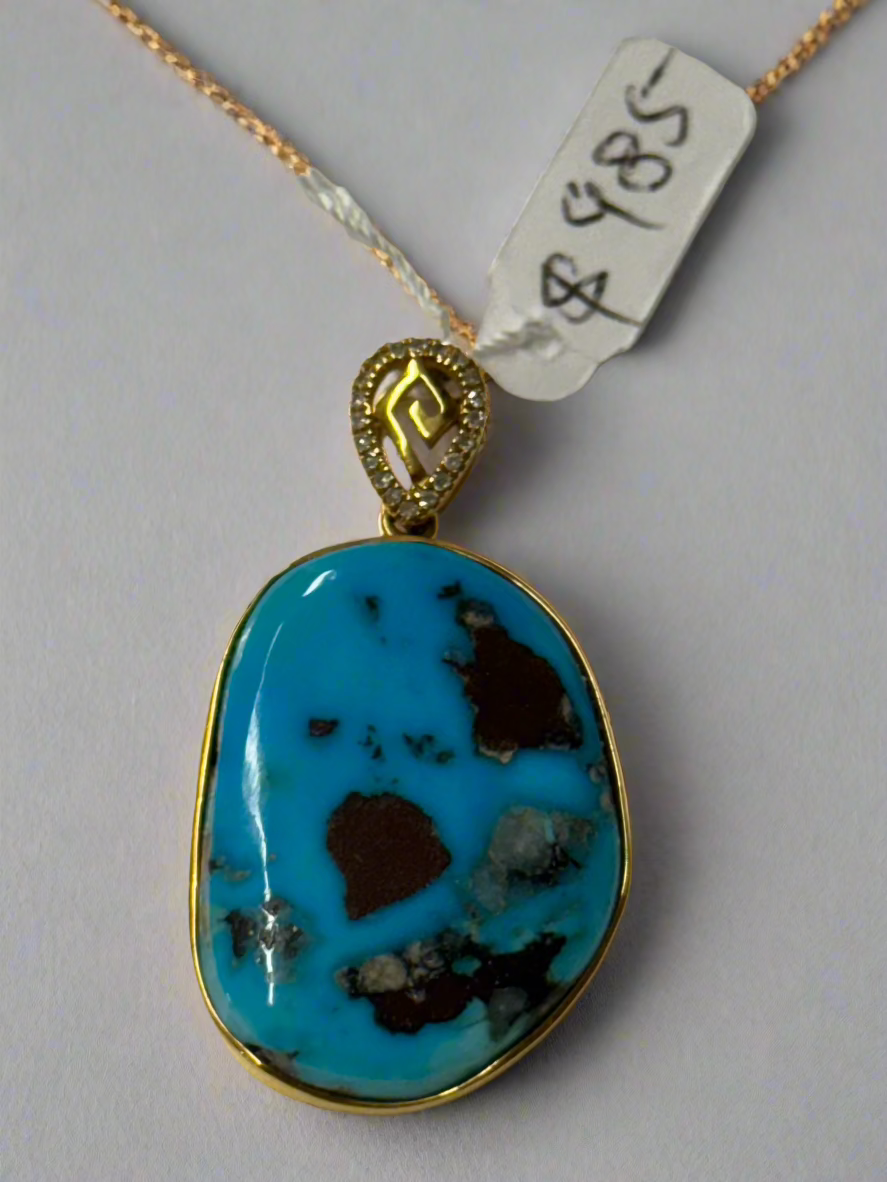 Turquoise pendant on 18K gold chain and diamond necklace