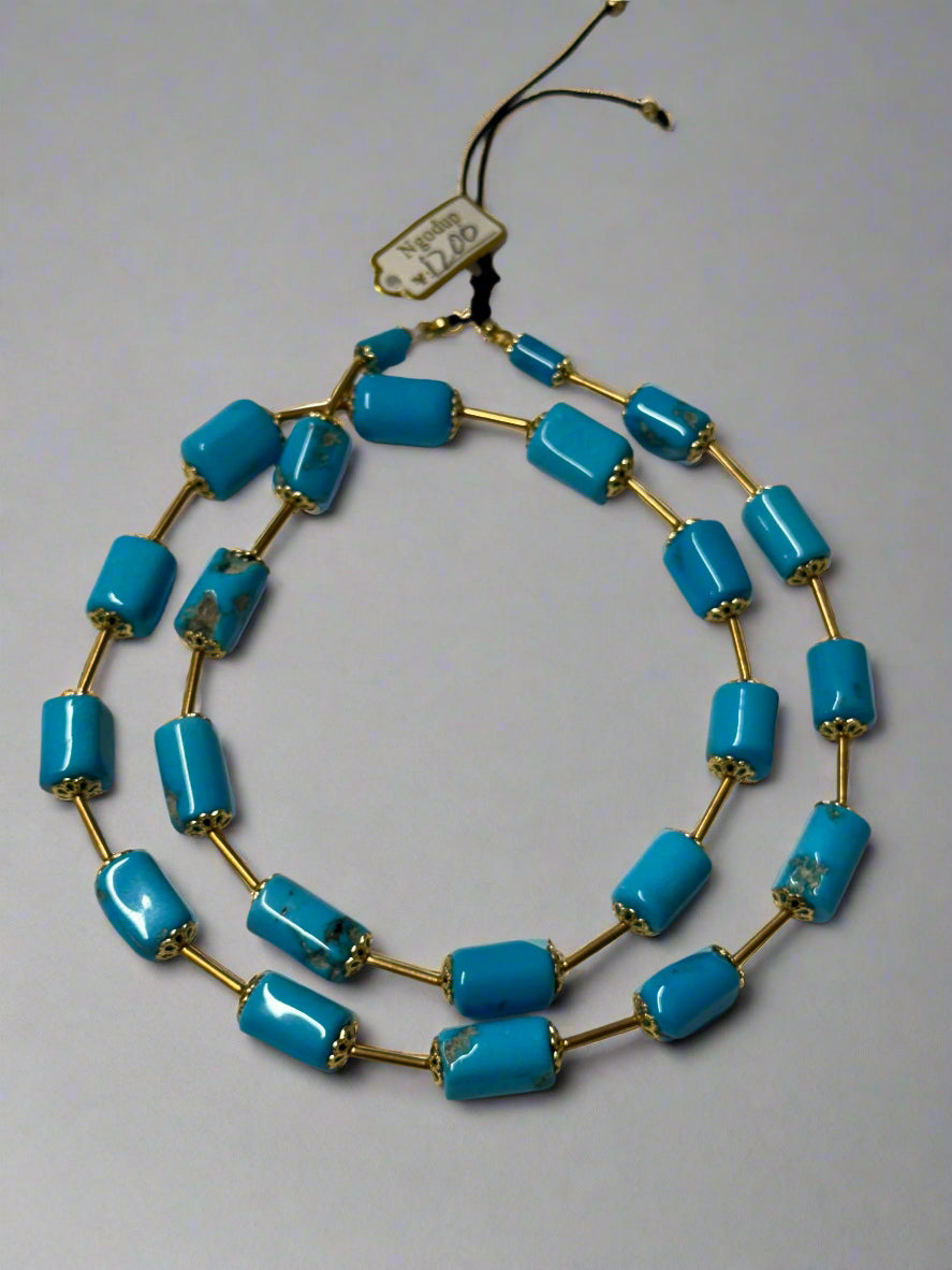 turquoise necklace.