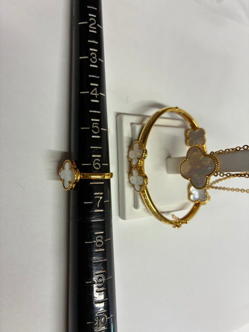 18k gold set of Earing,Ring,Pendant and Bracelet.
