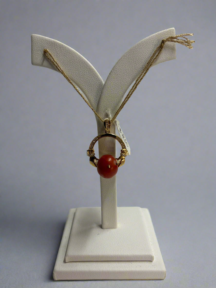 pendant gold with coral.