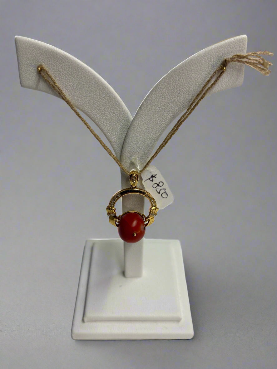 pendant gold with coral.