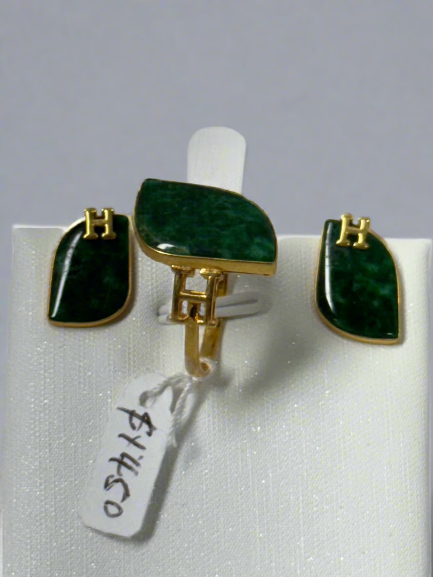 Green jade on a set of 18 karat gold and diamond ring and earrings