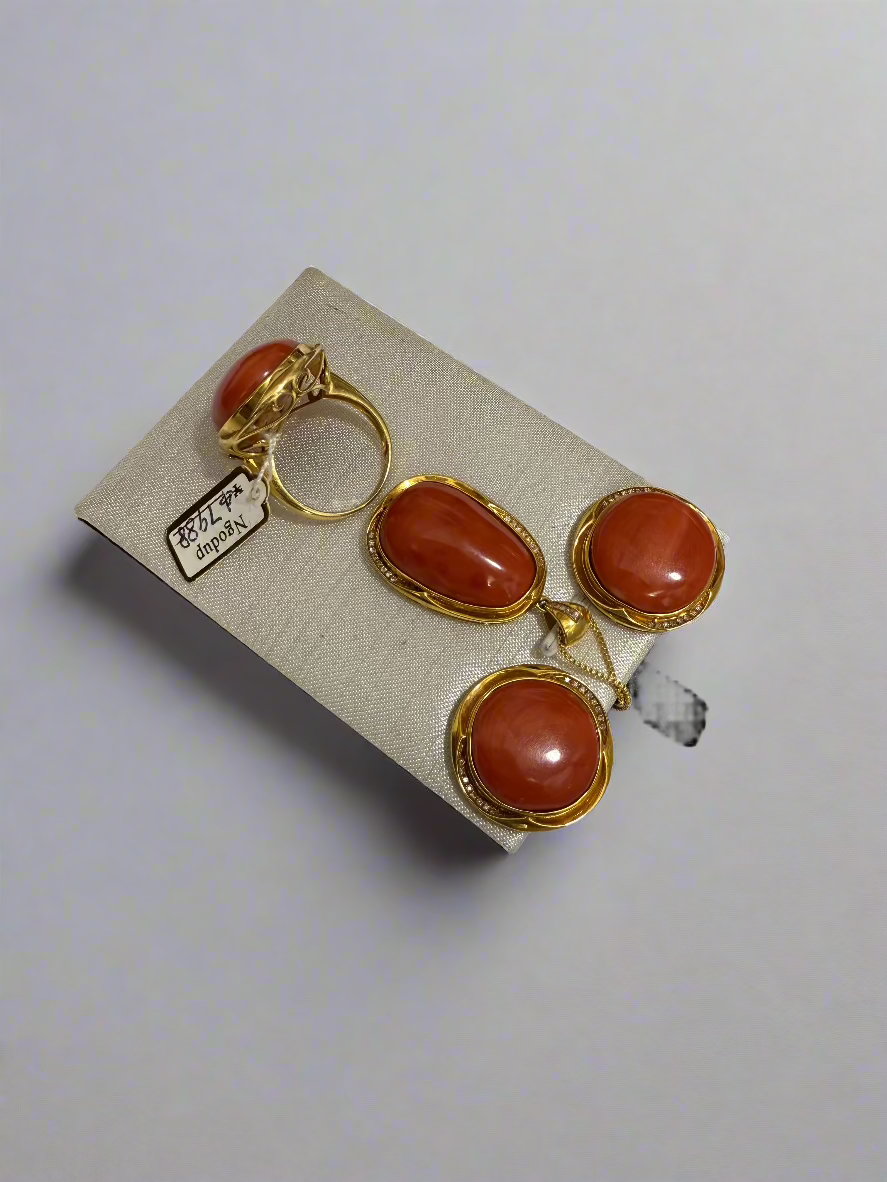 Set of 18k gold and diamond ring ,pendant and earring with authentic coral